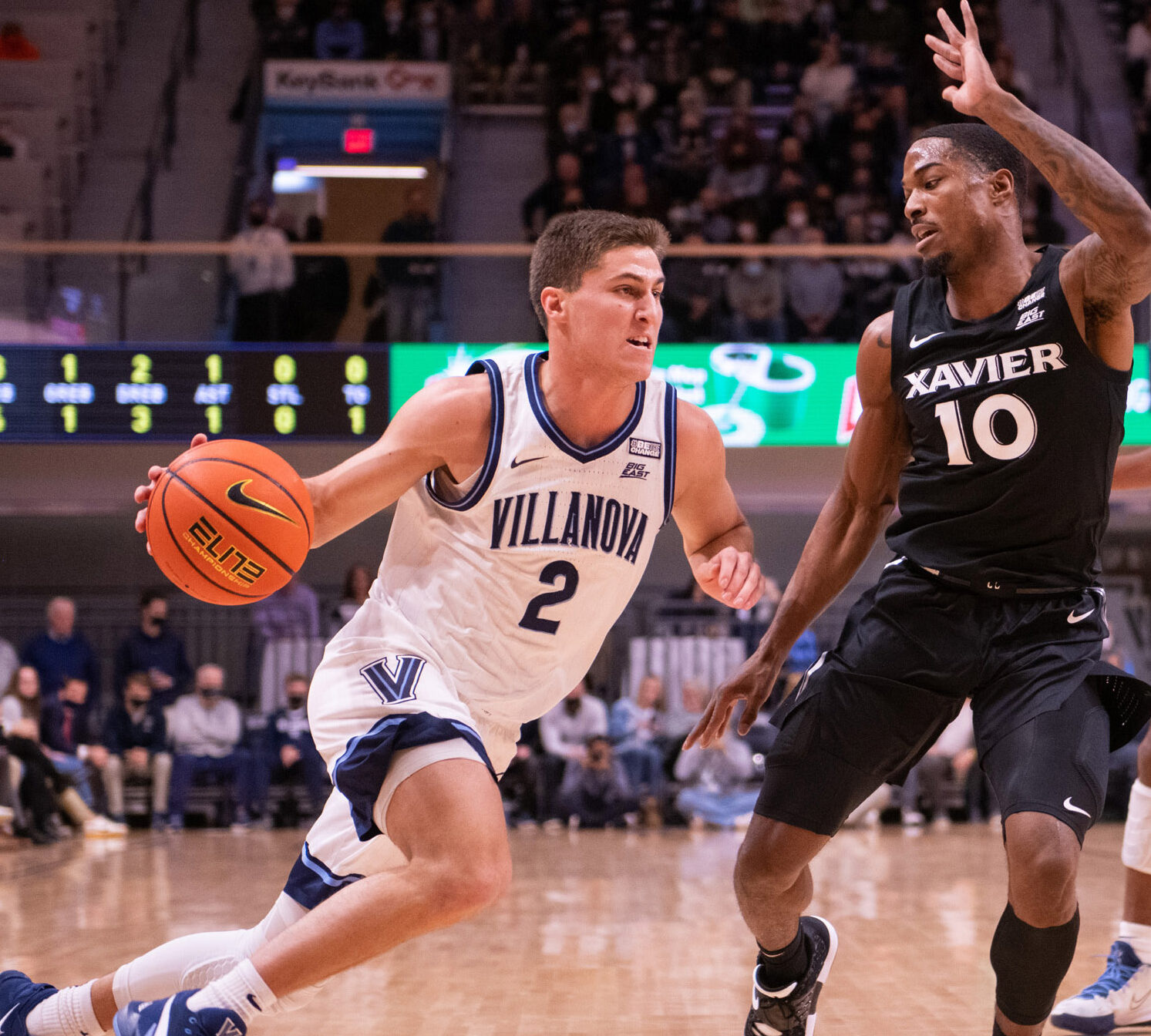 Villanova guard Collin Gillespie (left) drives past Xavier guard Nate Johnson (right) during a Big East Conference basketball game