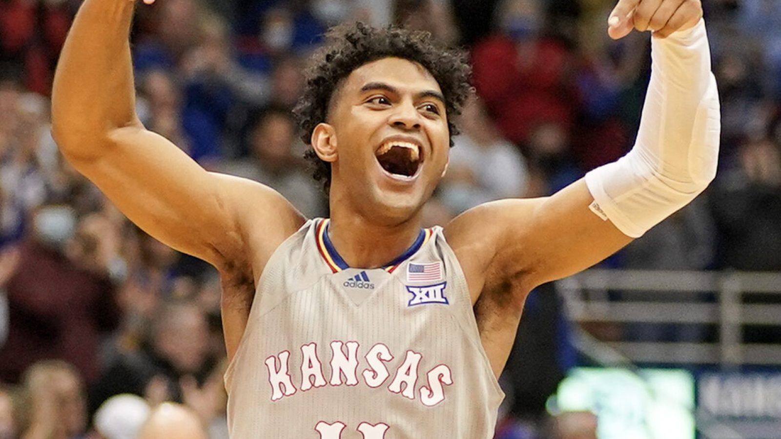 Kansas Jayhawks guard Remy Martin celebrates after making a basket against the Nevada Wolf Pack