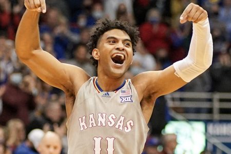Kansas Jayhawks guard Remy Martin celebrates after making a basket against the Nevada Wolf Pack