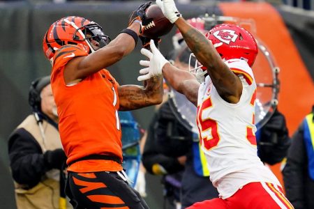 NFL Offensive Rookie Of The Year Odds - Cincinnati Bengals wide receiver Ja'Marr Chase (1) rises to catch a pass as Kansas City Chiefs cornerback Charvarius Ward (35) defends in the fourth quarter during a Week 17 NFL game, Sunday, Jan. 2, 2022, at Paul Brown Stadium in Cincinnati. The Cincinnati Bengals defeated the Kansas City Chiefs, 34-31. With the win the, the Cincinnati Bengals won the AFC North division and advance to the NFL playoffs. Kansas City Chiefs At Cincinnati Bengals Jan 2