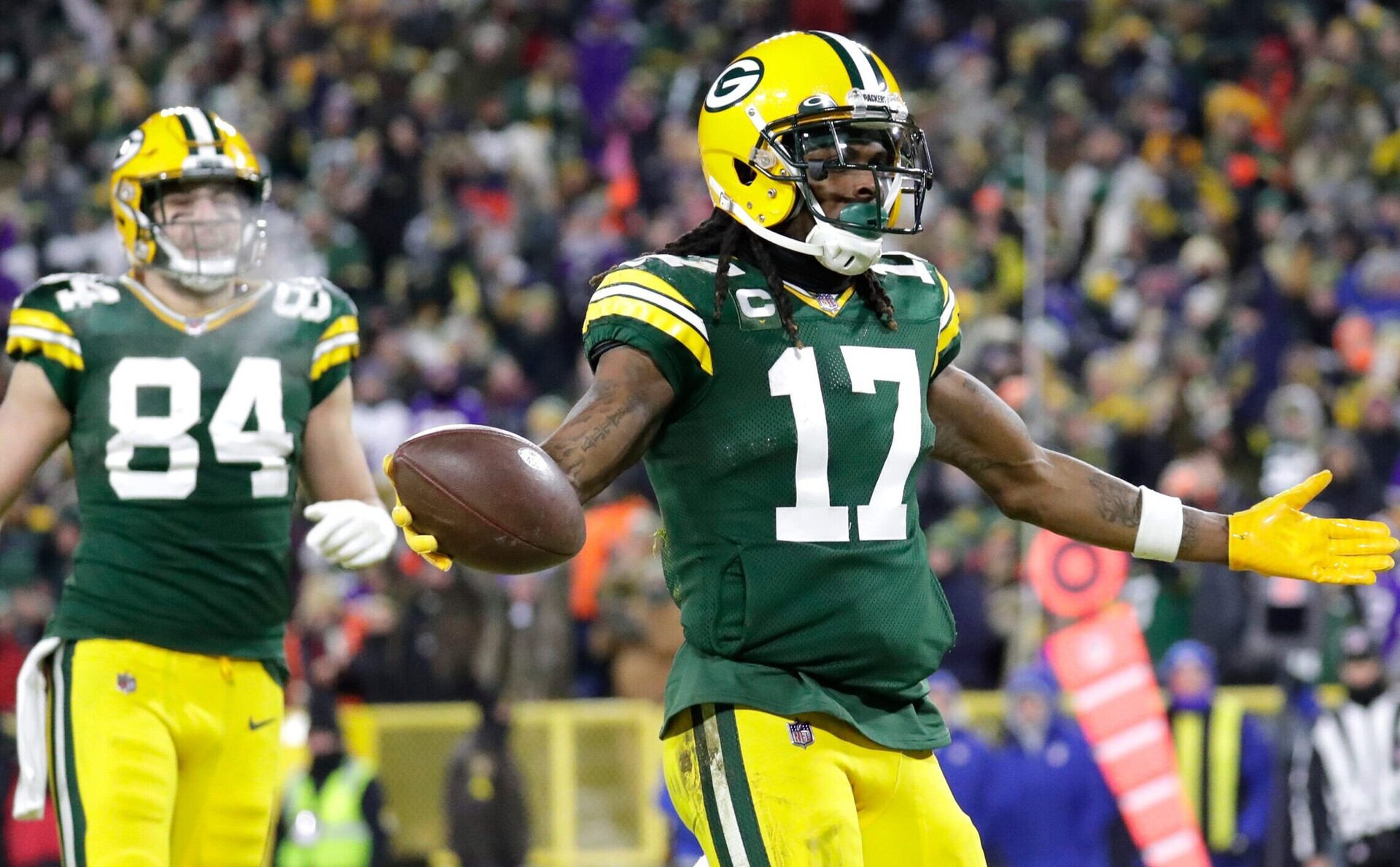 Green Bay Packers wide receiver Davante Adams (right) celebrates after scoring a touchdown against the Vikings.