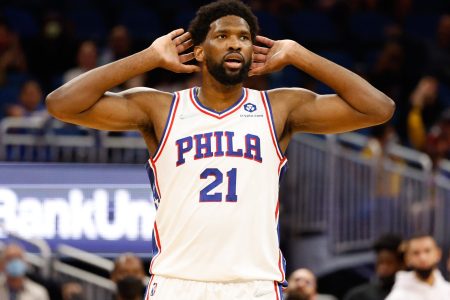 Philadelphia 76ers center Joel Embiid reacts to chants of MVP from the crowd during a game against the Orlando Magic