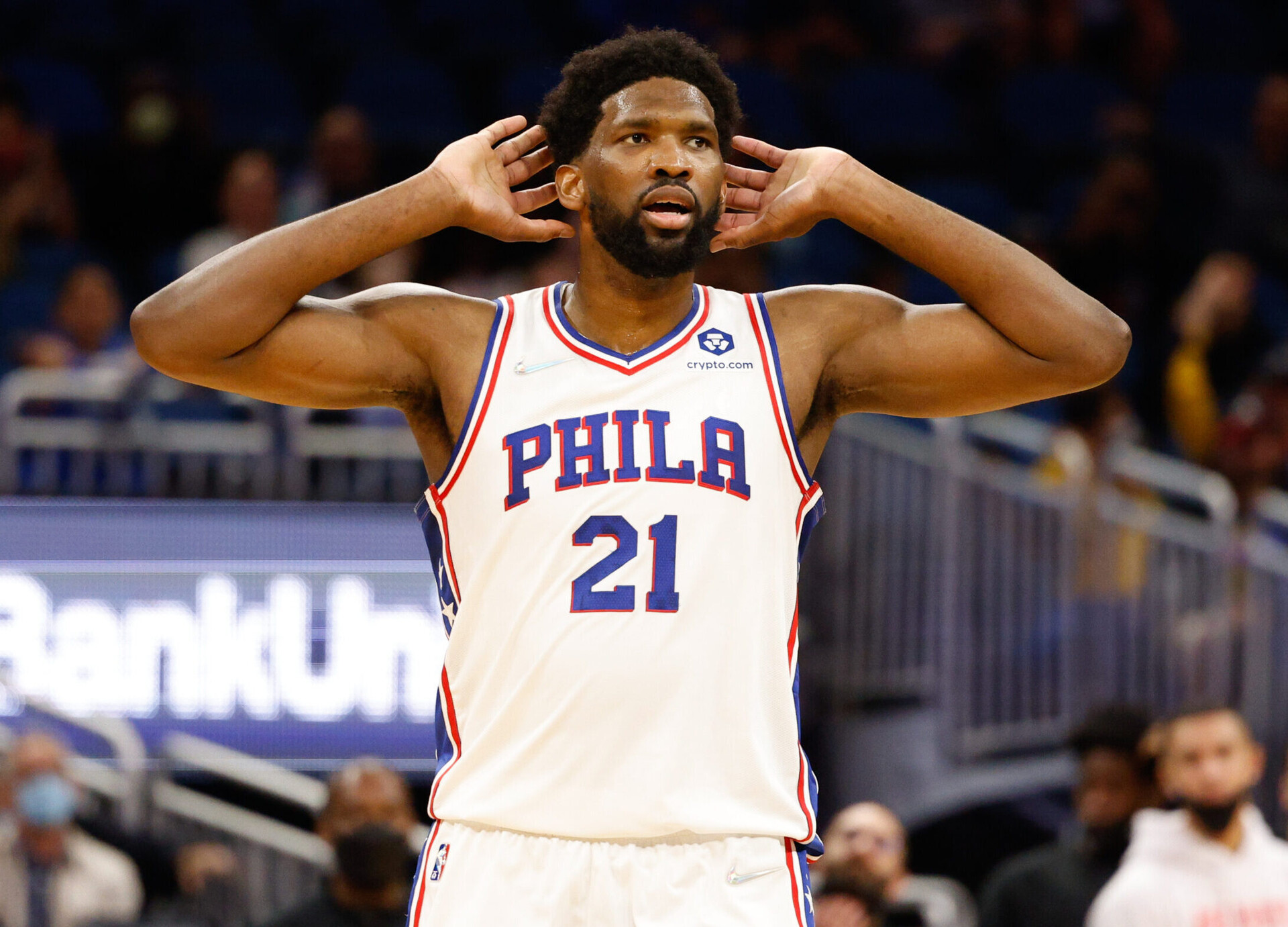 Philadelphia 76ers center Joel Embiid reacts to chants of MVP from the crowd during a game against the Orlando Magic