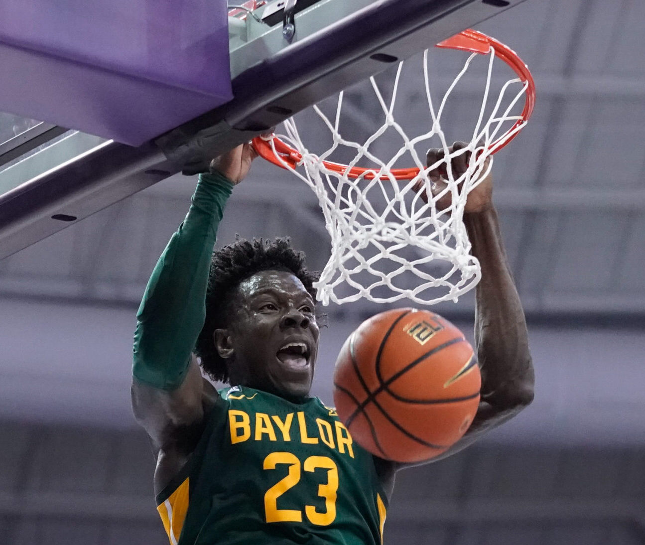 Baylor Bears forward Jonathan Tchamwa Tchatchoua dunks the ball against the TCU Horned Frogs during a Big 12 basketball game