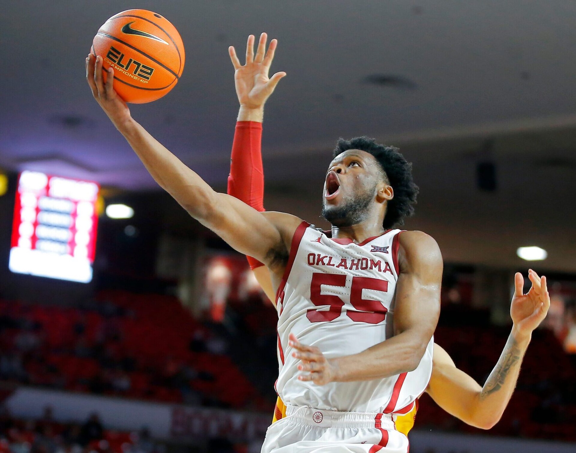Oklahoma Sooners guard Elijah Harkless goes to the basket during a Big 12 basketball game against the Iowa State Cyclones