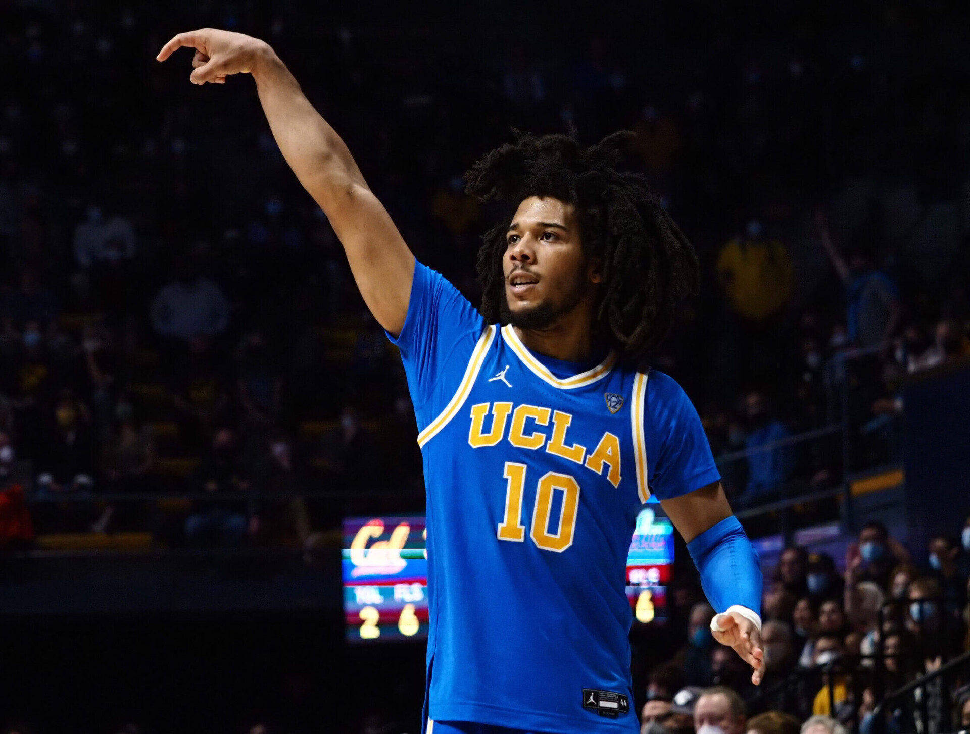 UCLA Bruins guard Tyger Campbell follows through on a three-point basket against the California Golden Bears