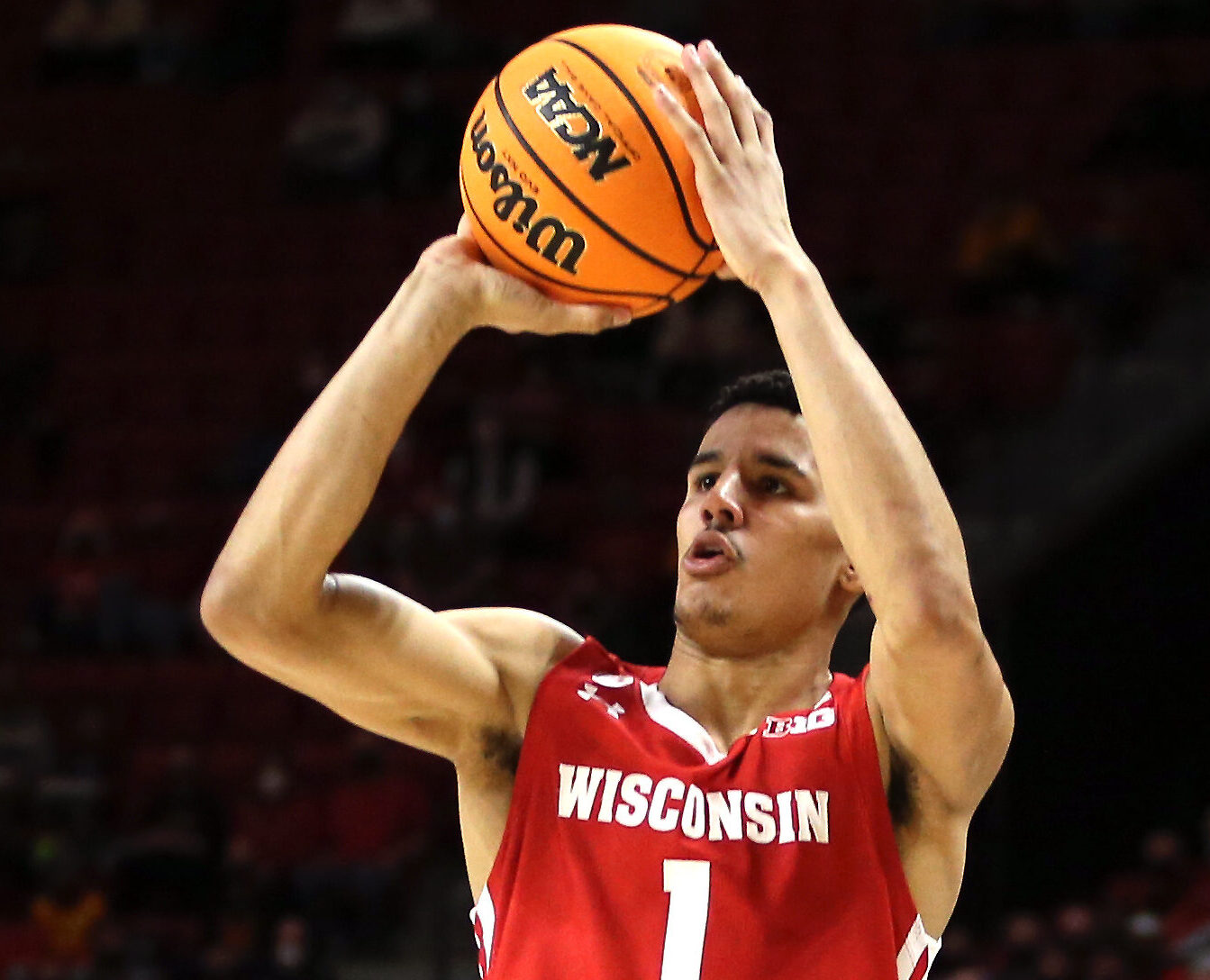 Wisconsin Badgers guard Johnny Davis takes a shot against the Maryland Terrapins during the first half of a Big Ten basketball game.