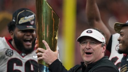 Jan 10, 2022; Indianapolis, IN, USA; Georgia Bulldogs head coach Kirby Smart holds the National Championship trophy after defeating the Alabama Crimson Tide in the 2022 CFP college football national championship game at Lucas Oil Stadium. Mandatory Credit: Kirby Lee-USA TODAY Sports