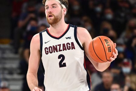 Gonzaga Bulldogs forward Drew Timme brings the ball down court against the Brigham Young Cougars