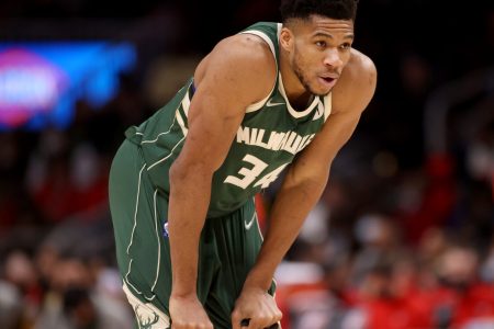 Milwaukee Bucks forward Giannis Antetokounmpo bends over with is hands on his knees after getting fouled against the Atlanta Hawks