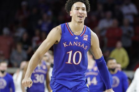 Kansas Jayhawks forward Jalen Wilson reacts after his team scores against the Oklahoma Sooners during a Big 12 basketball game.