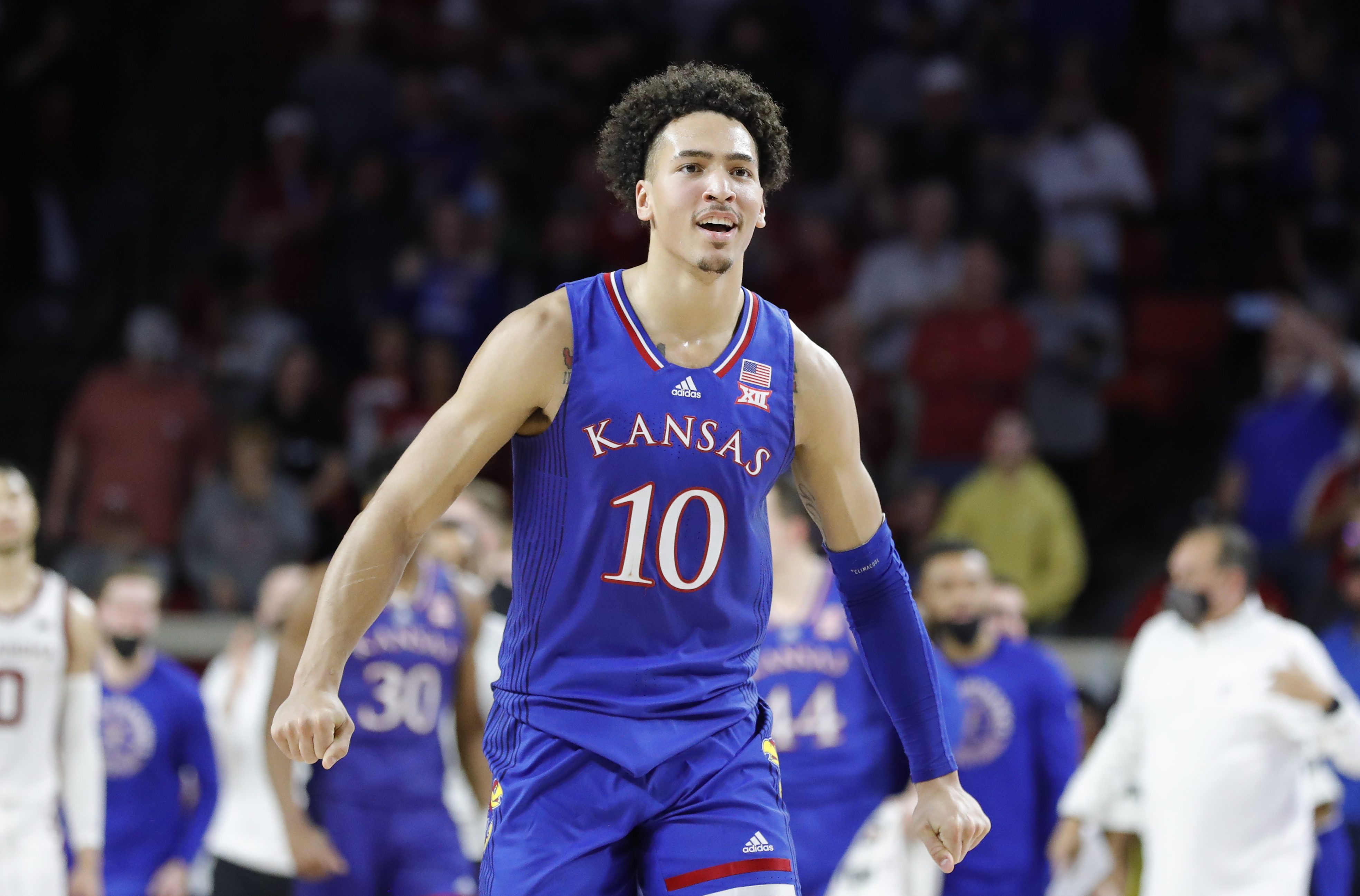 Kansas Jayhawks forward Jalen Wilson reacts after his team scores against the Oklahoma Sooners during a Big 12 basketball game.