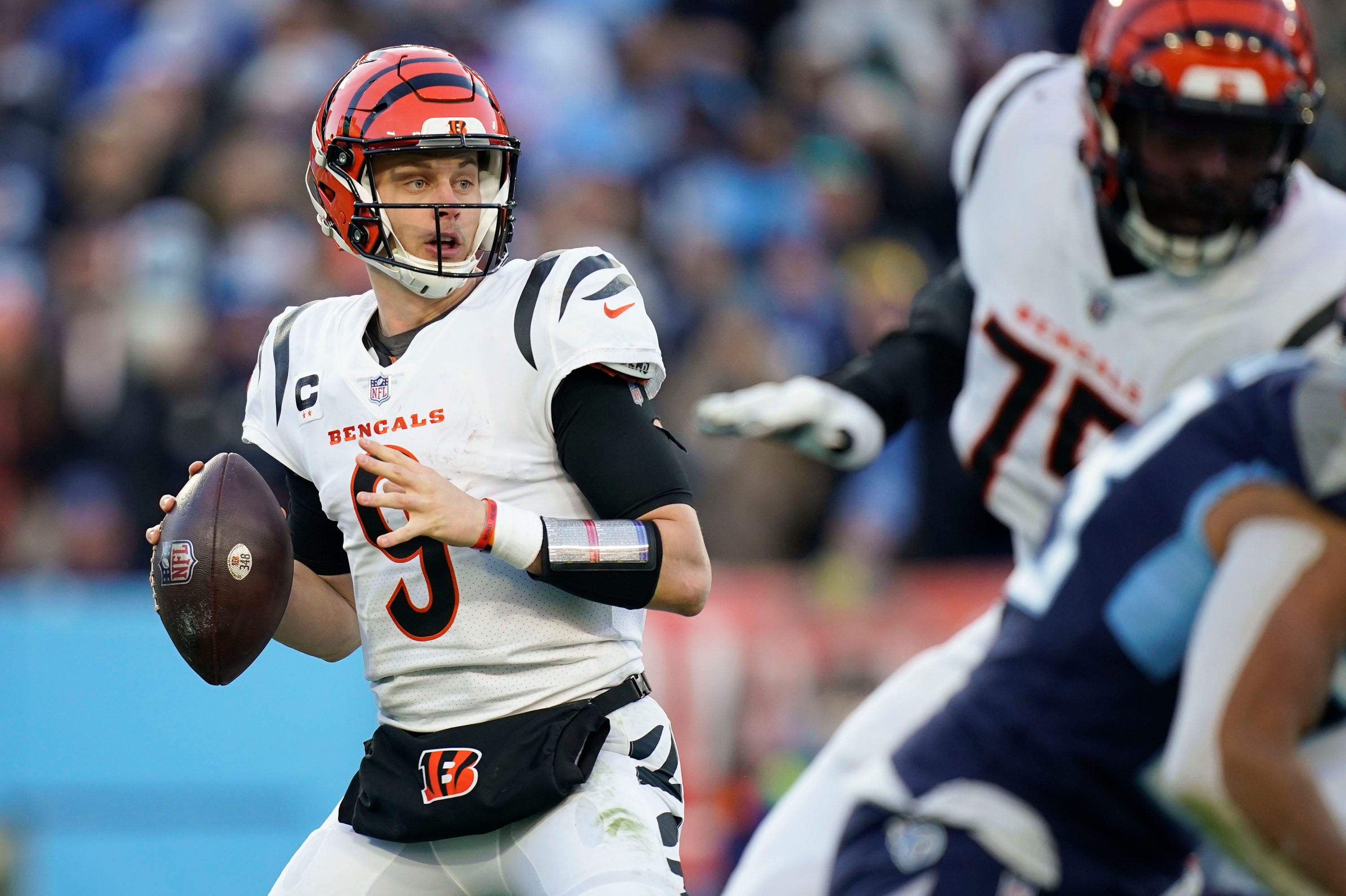 Cincinnati Bengals quarterback Joe Burrow (9) looks for a receiver during the second quarter of an AFC divisional playoff game at Nissan Stadium Saturday, Jan. 22, 2022 in Nashville, Tenn. Titans Bengals 142