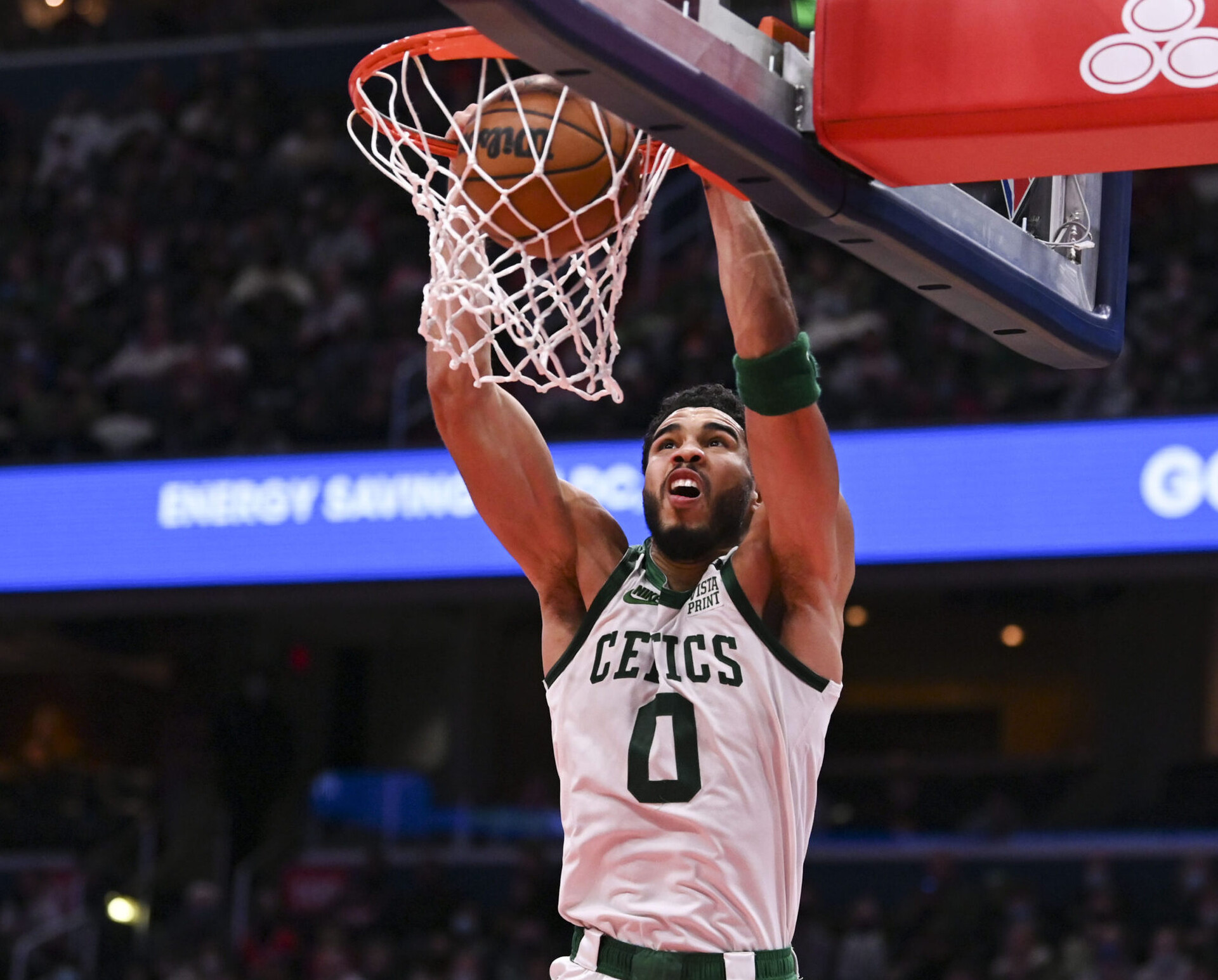Boston Celtics forward Jayson Tatum (0) dunks the basketball against the Washington Wizards