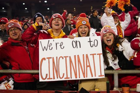 Kansas City Chiefs fans celebrate following their team's overtime win against the Buffalo Bills in the AFC Divisional playoffs