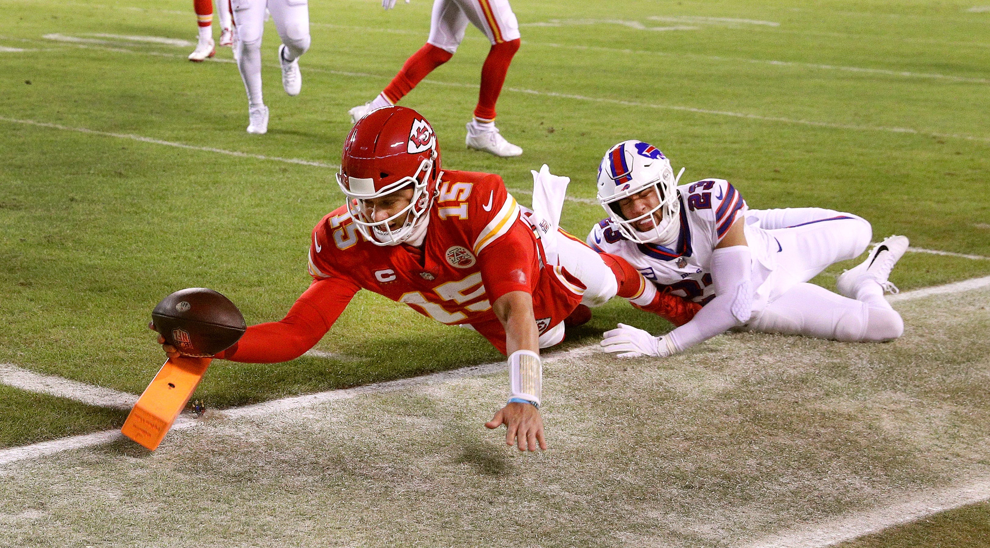 Chiefs quarterback Patrick Mahomes dives into the end zone for an 8-yard touchdown against the Bills Micah Hyde. The Chiefs won 42-36 in overtime. Syndication Democrat And Chronicle
