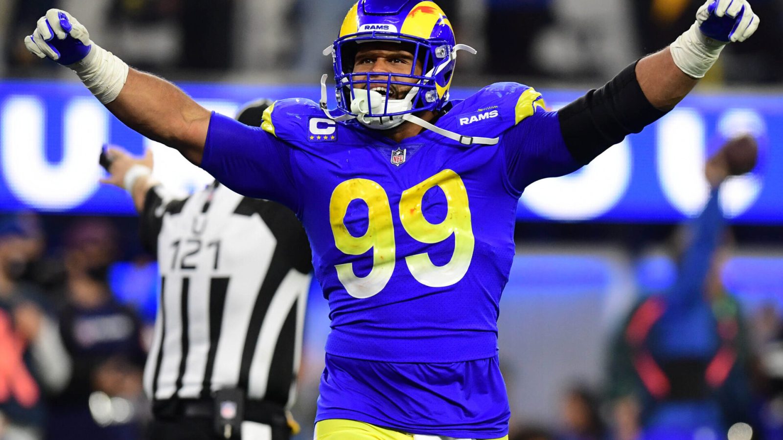 Jan 30, 2022; Inglewood, California, USA; Los Angeles Rams defensive end Aaron Donald (99) celebrates in the fourth quarter during the NFC Championship Game against the San Francisco 49ers at SoFi Stadium. Mandatory Credit: Gary A. Vasquez-USA TODAY Sports