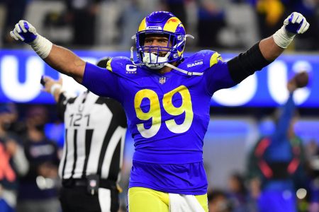 Jan 30, 2022; Inglewood, California, USA; Los Angeles Rams defensive end Aaron Donald (99) celebrates in the fourth quarter during the NFC Championship Game against the San Francisco 49ers at SoFi Stadium. Mandatory Credit: Gary A. Vasquez-USA TODAY Sports