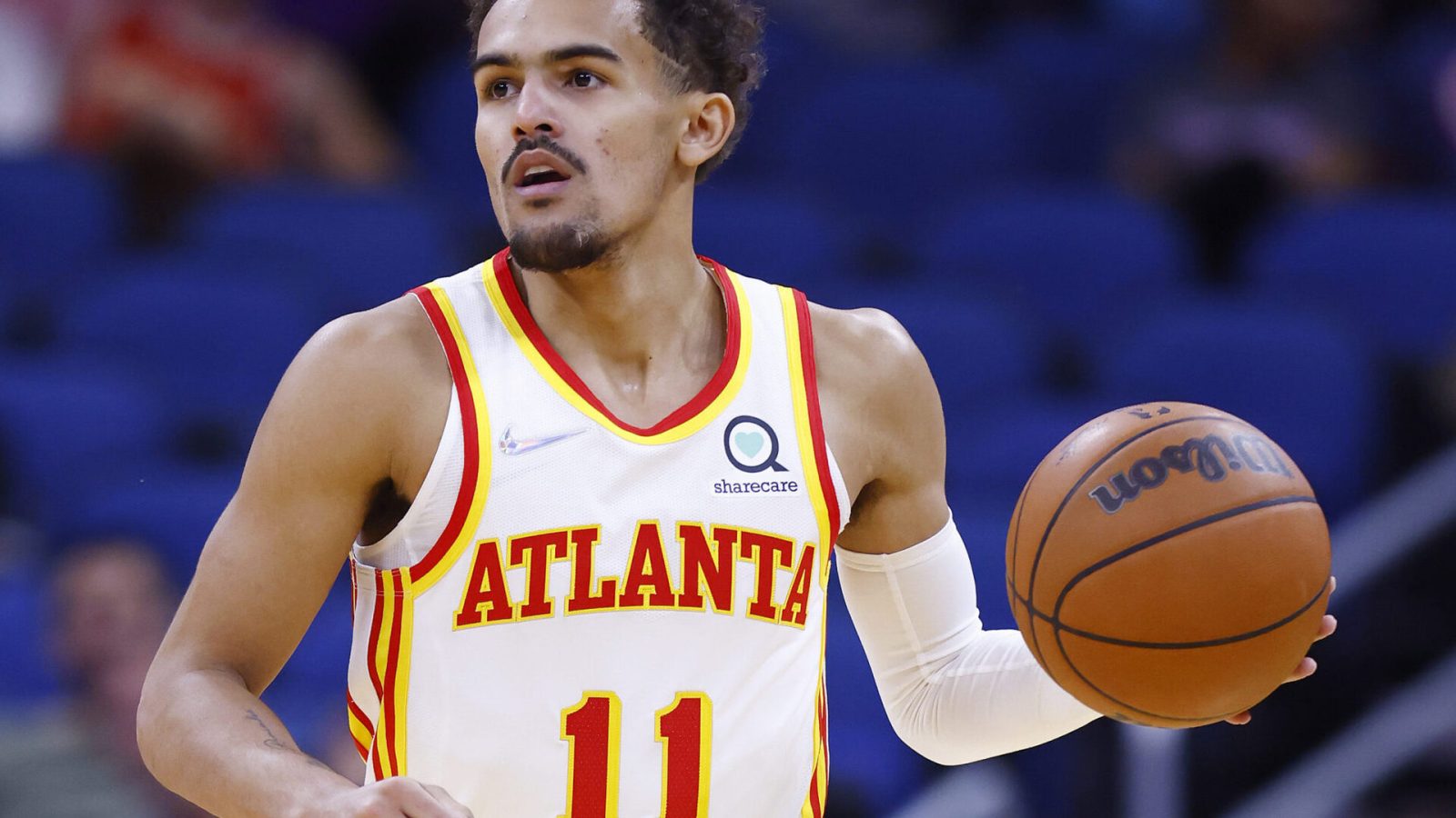 Trae Young #11 of the Atlanta Hawks in action against the Orlando Magic during the first half at Amway Center on December 15, 2021 in Orlando, Florida.