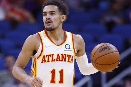 Trae Young #11 of the Atlanta Hawks in action against the Orlando Magic during the first half at Amway Center on December 15, 2021 in Orlando, Florida.