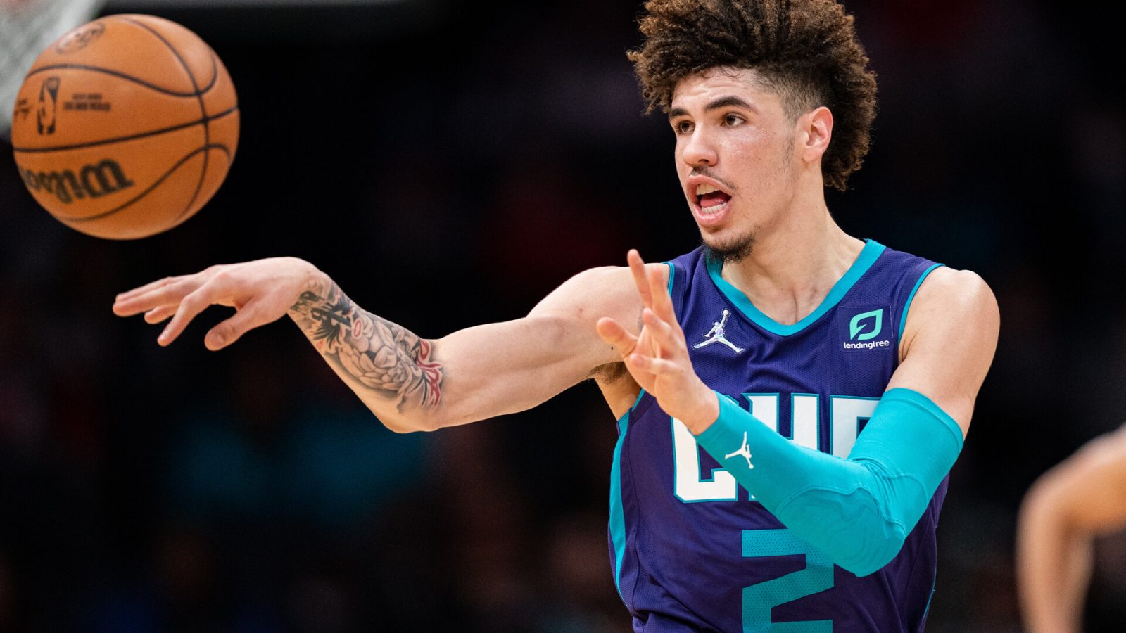 Charlotte Hornets tosses a pass to a teammate during a game against the Los Angeles Clippers
