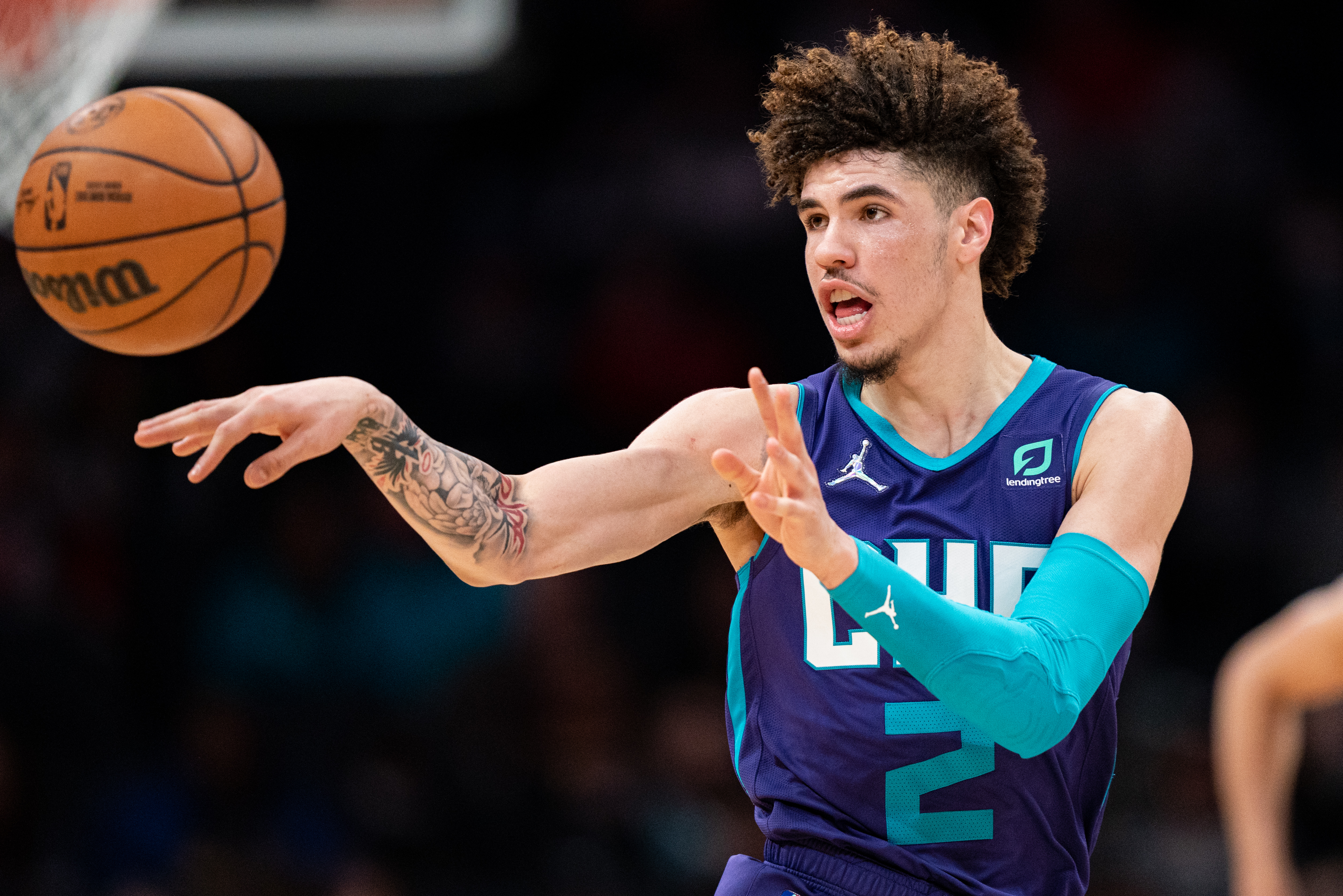 Charlotte Hornets tosses a pass to a teammate during a game against the Los Angeles Clippers
