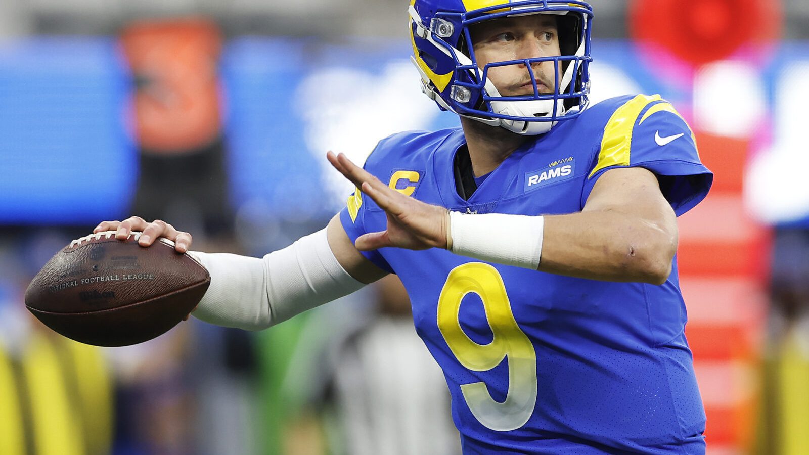 Matthew Stafford #9 of the Los Angeles Rams passes the ball in the NFC Championship Game against the San Francisco 49ers at SoFi Stadium on January 30, 2022 in Inglewood, California.
