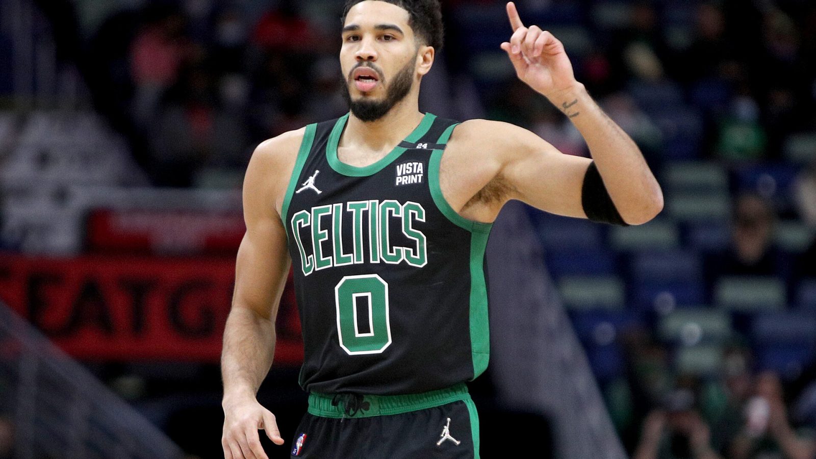 Jayson Tatum #0 of the Boston Celtics reacts after scoring during the first quarter of an NBA game against the New Orleans Pelicans at Smoothie King Center on January 29, 2022 in New Orleans, Louisiana.