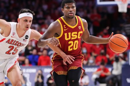 Arizona Wildcats guard Kerr Kriisa (left) defends USC guard Ethan Anderson (right) during a Pac-12 basketball game