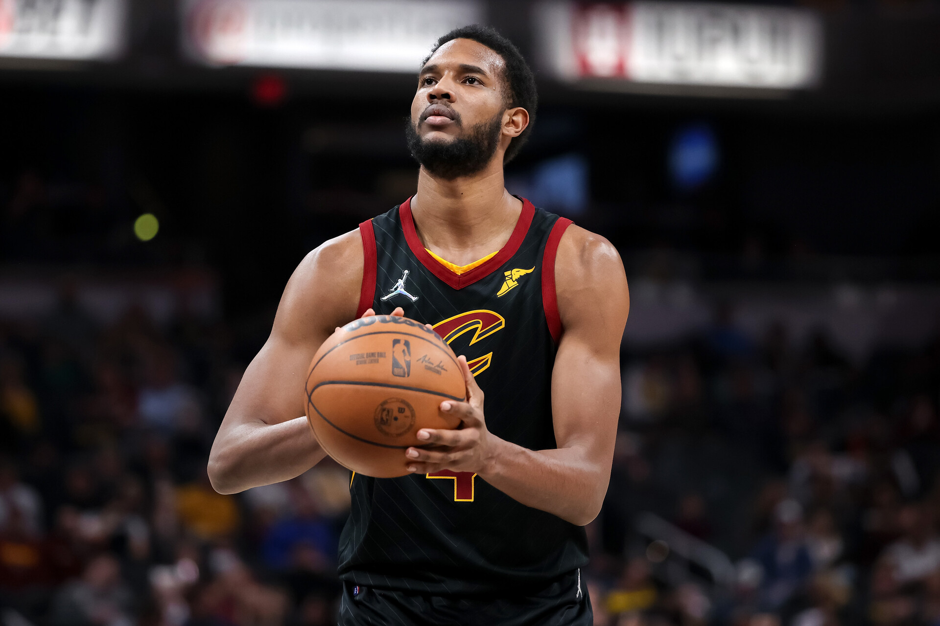 Evan Mobley #4 of the Cleveland Cavaliers attempts a free throw in the third quarter against the Indiana Pacers at Gainbridge Fieldhouse on February 11, 2022 in Indianapolis, Indiana.