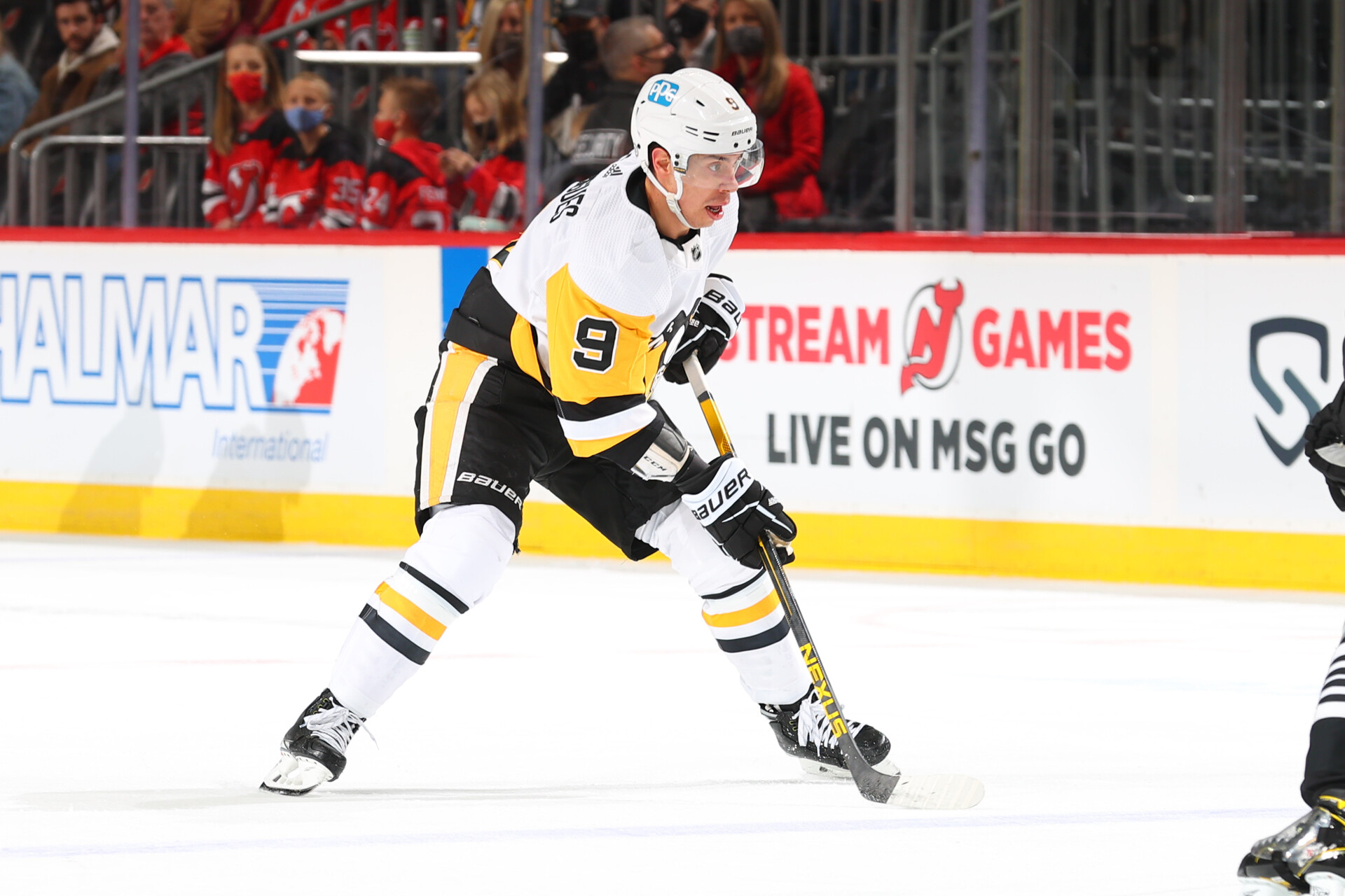 Evan Rodrigues #9 of the Pittsburgh Penguins skates against the New Jersey Devils on February 13, 2022 at the Prudential Center in Newark, New Jersey.