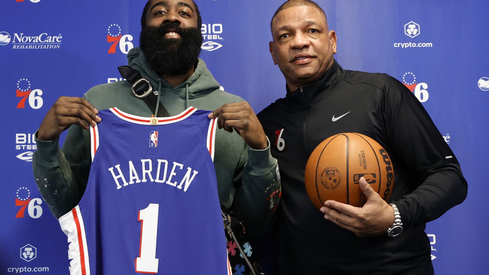 James Harden #1 and head coach Doc Rivers of the Philadelphia 76ers pose for photos during a press conference at the Seventy Sixers Practice Facility on February 15, 2022 in Camden, New Jersey.