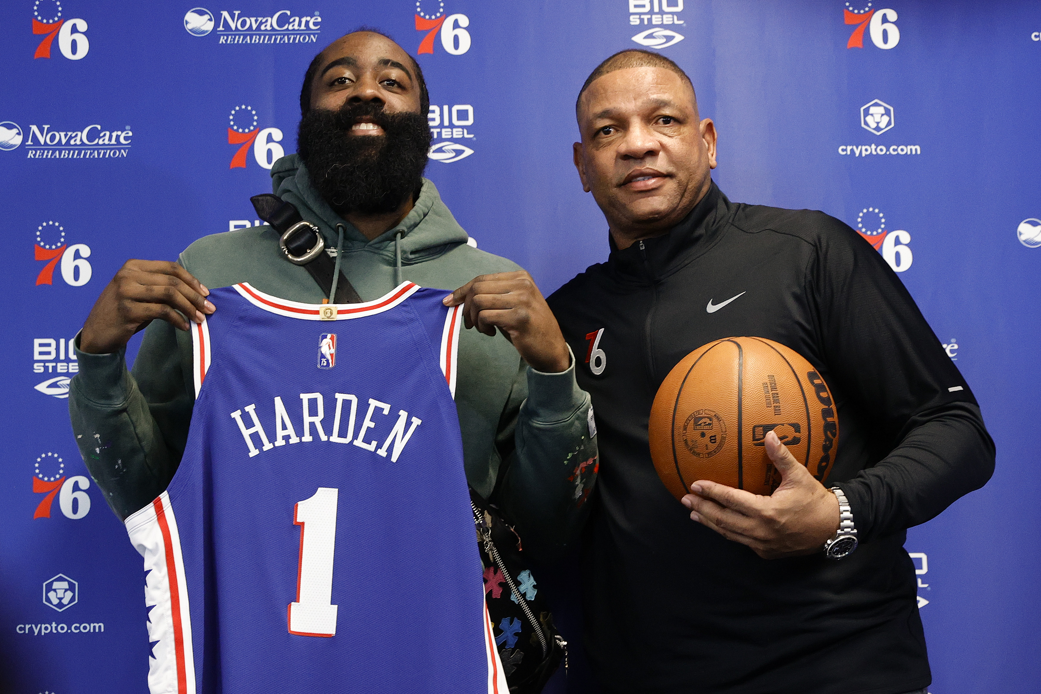 James Harden #1 and head coach Doc Rivers of the Philadelphia 76ers pose for photos during a press conference at the Seventy Sixers Practice Facility on February 15, 2022 in Camden, New Jersey.