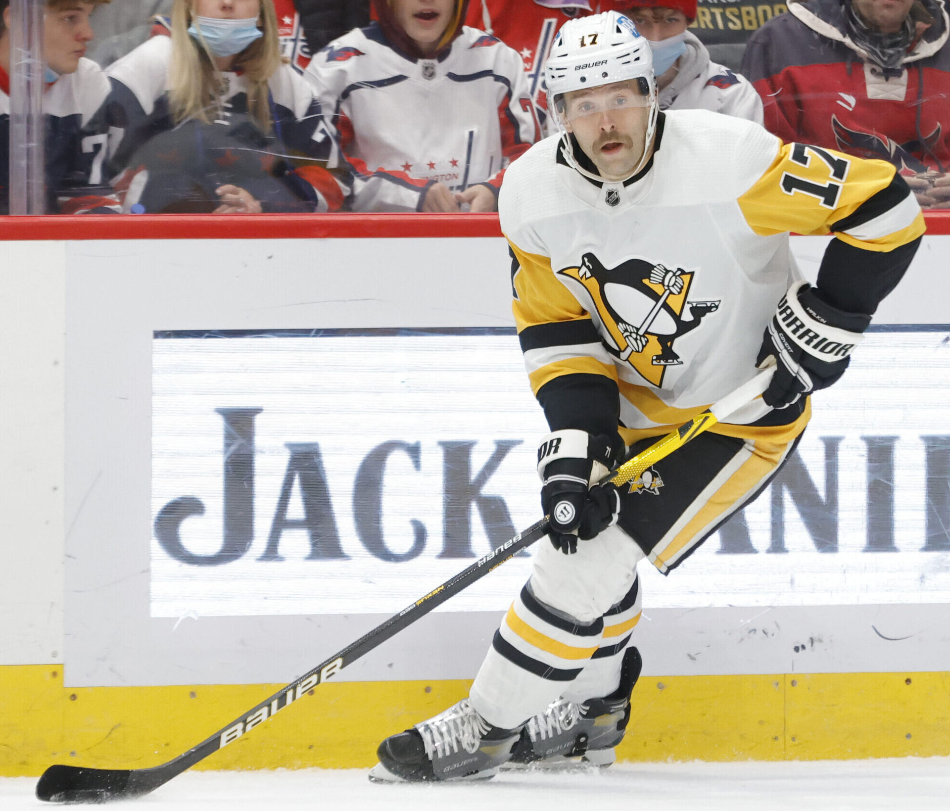 Pittsburgh Penguins right wing Bryan Rust skates with the puck against the Washington Capitals