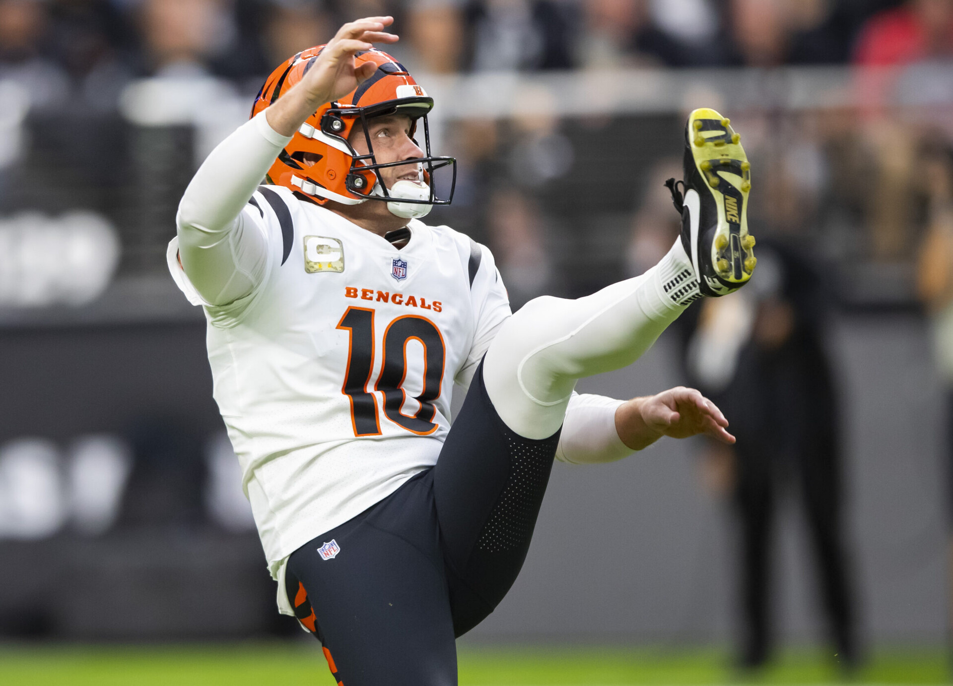 Cincinnati Bengals punter Kevin Huber follows through on a punt in a game against the Las Vegas Raiders