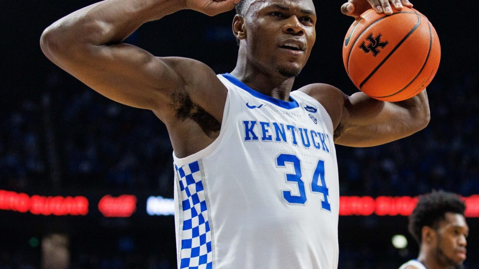 Kentucky Wildcats forward Oscar Tshiebwe flexes after getting fouled during an SEC basketball game against the Missouri Tigers