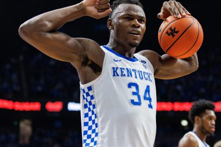Kentucky Wildcats forward Oscar Tshiebwe flexes after getting fouled during an SEC basketball game against the Missouri Tigers