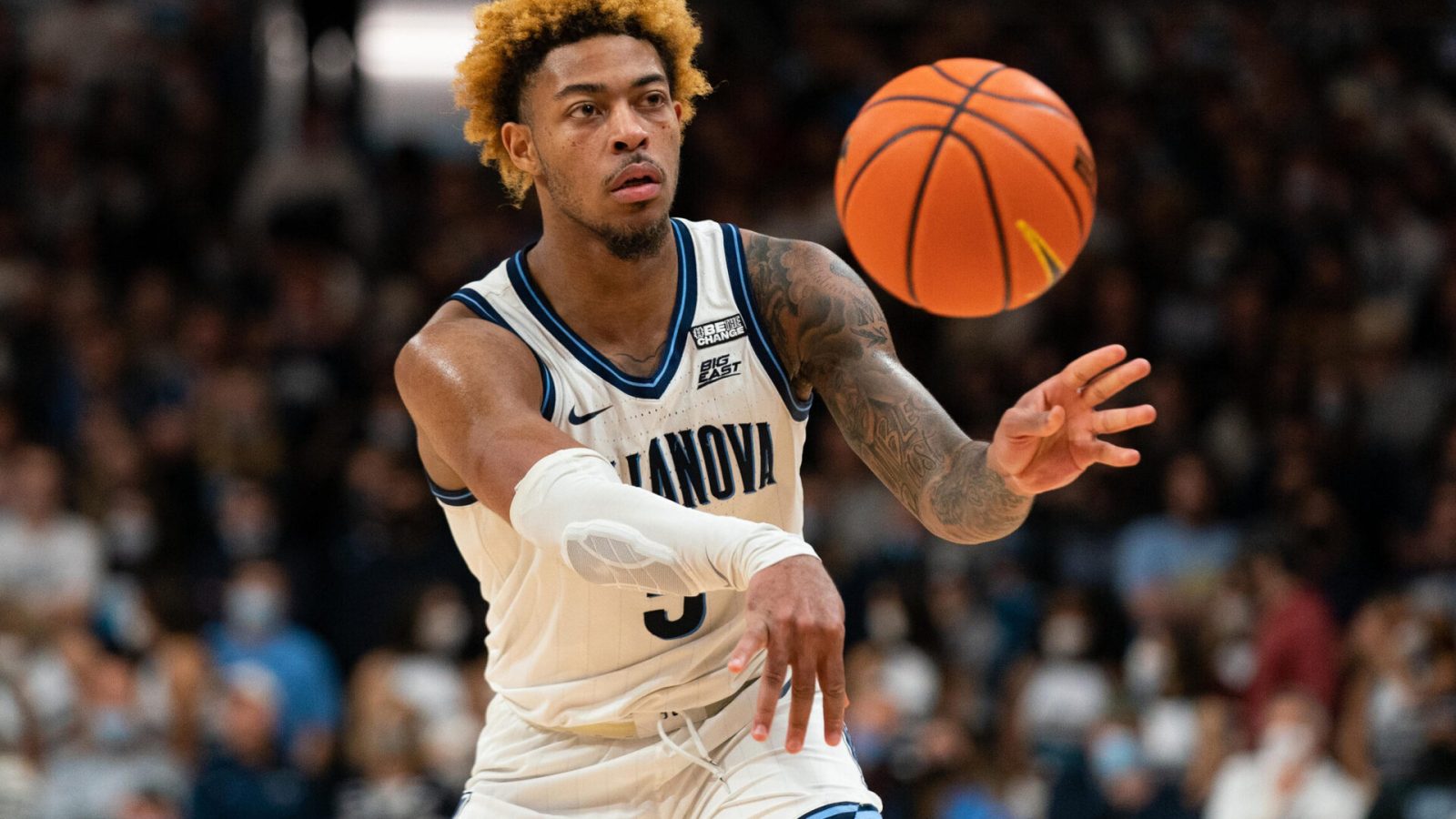 Villanova Wildcats guard Justin Moore passes the ball against the Creighton Bluejays