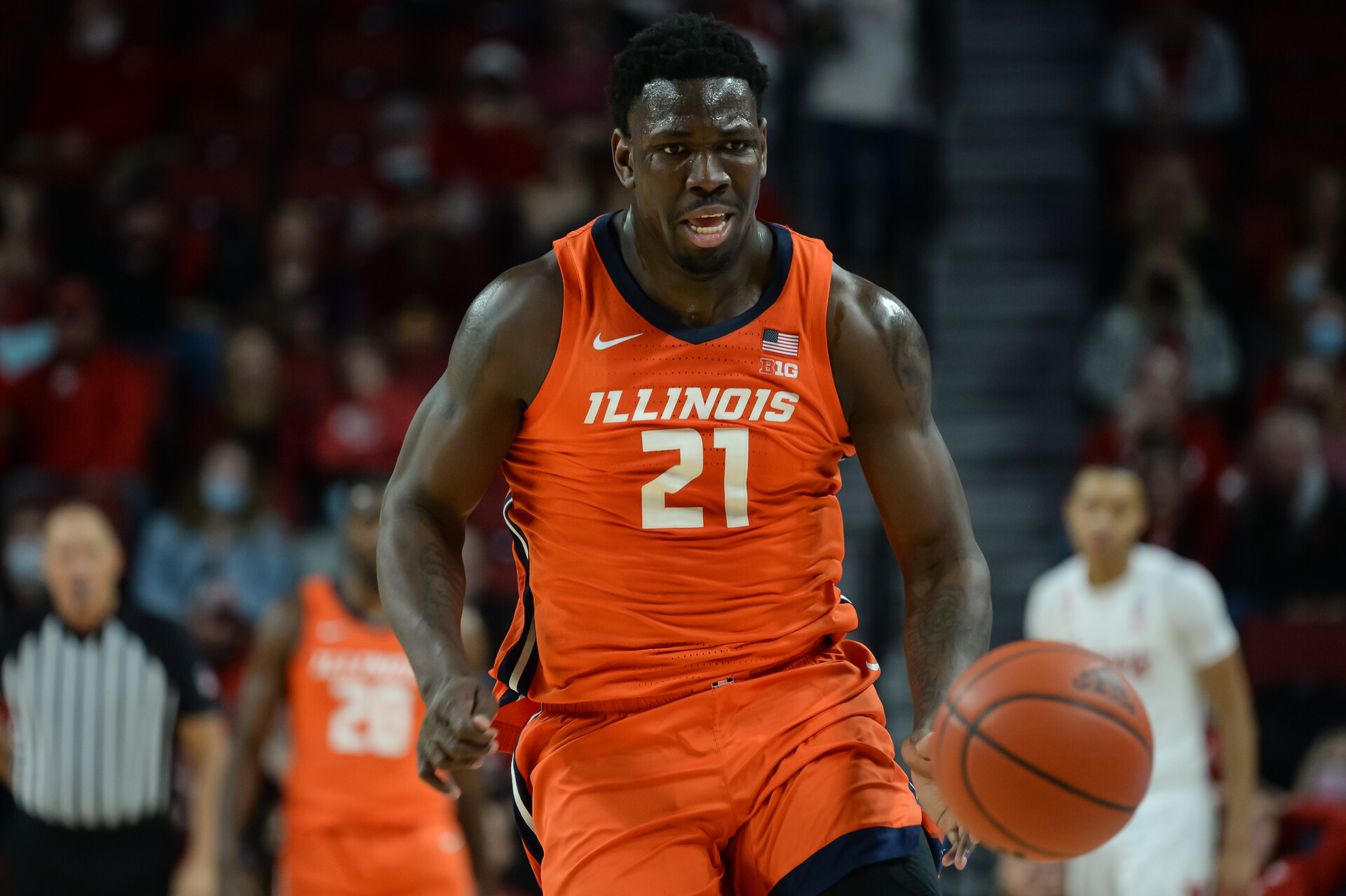 Illinois Fighting Illini center Kofi Cockburn chases down a loose ball against the Nebraska Cornhuskers