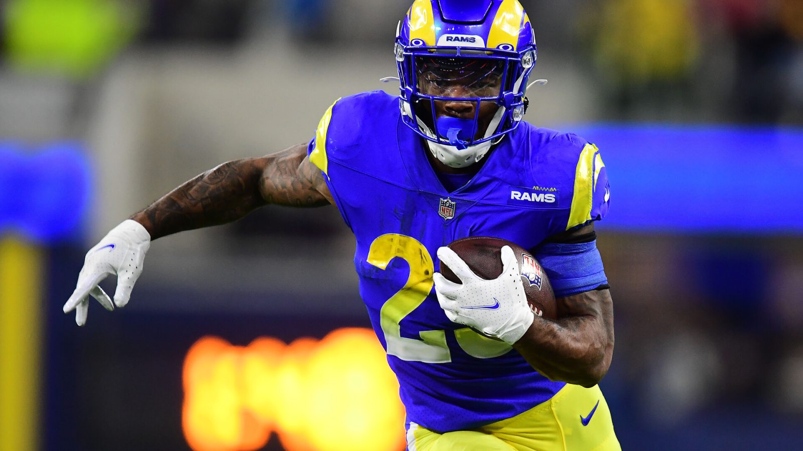 Los Angeles Rams running back Cam Akers runs the ball against the Arizona Cardinals during the second half in the NFC Wild Card playoff football game
