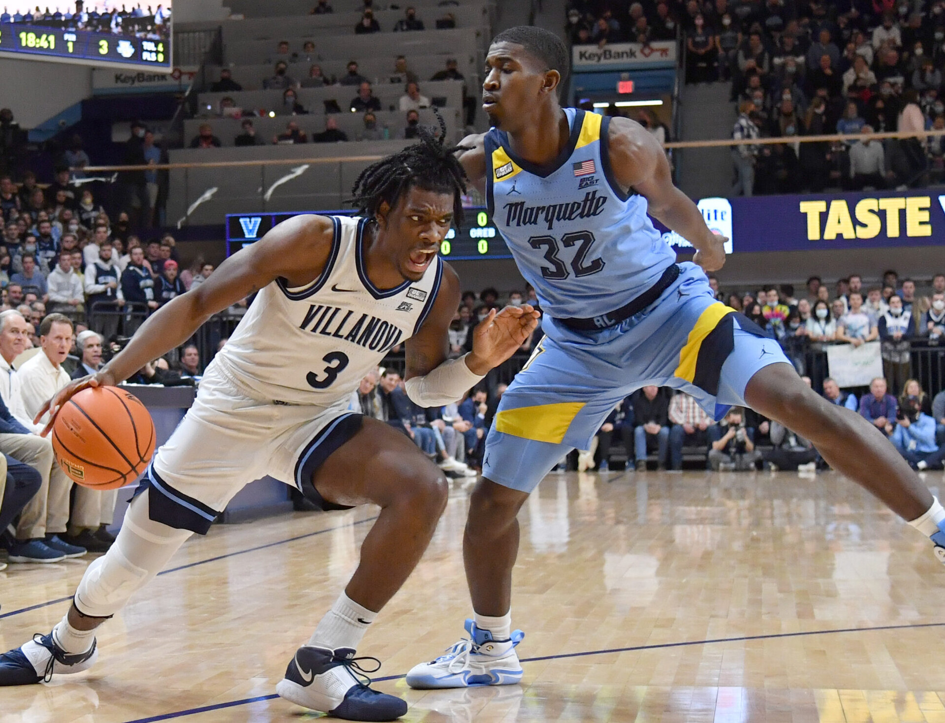 Villanova Wildcats forward Brandon Slater (left) drives to the basket against Marquette Golden Eagles guard Darryl Morsell (left) during a Big East Conference basketball game.
