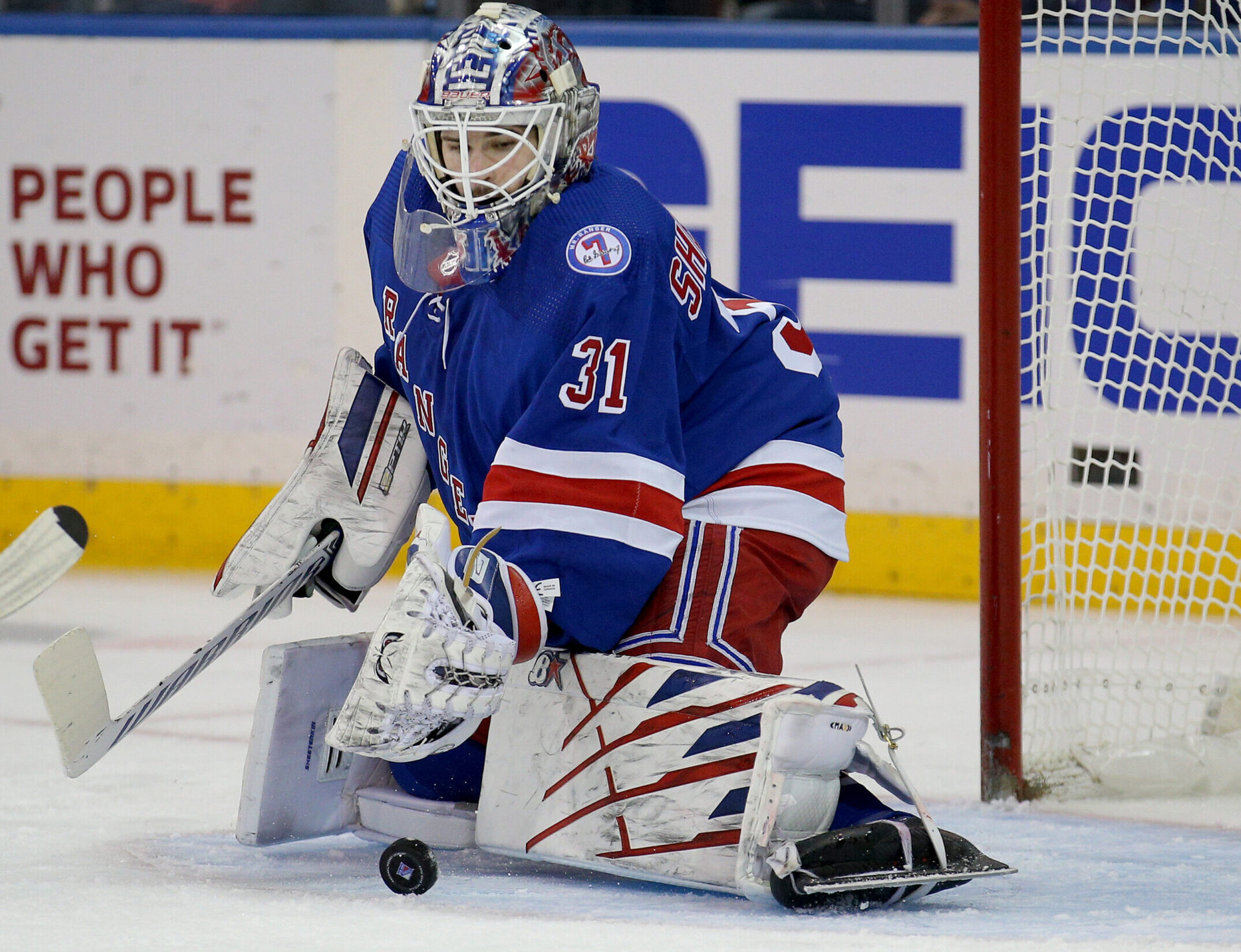 New York Rangers goaltender Igor Shesterkin plays the puck against the Toronto Maple Leafs