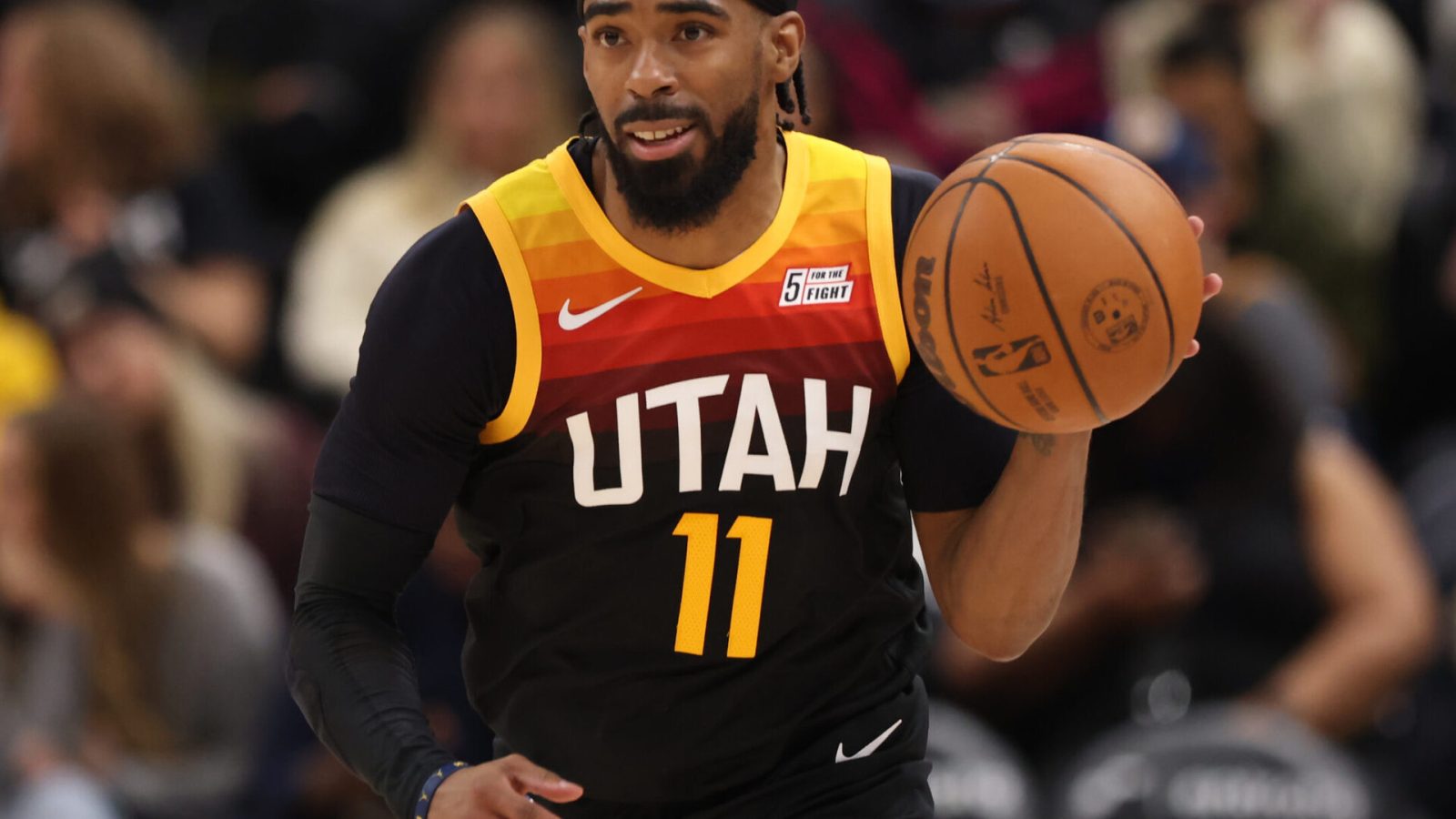 Utah Jazz guard Mike Conley brings the ball up the court in the third quarter against the Houston Rockets
