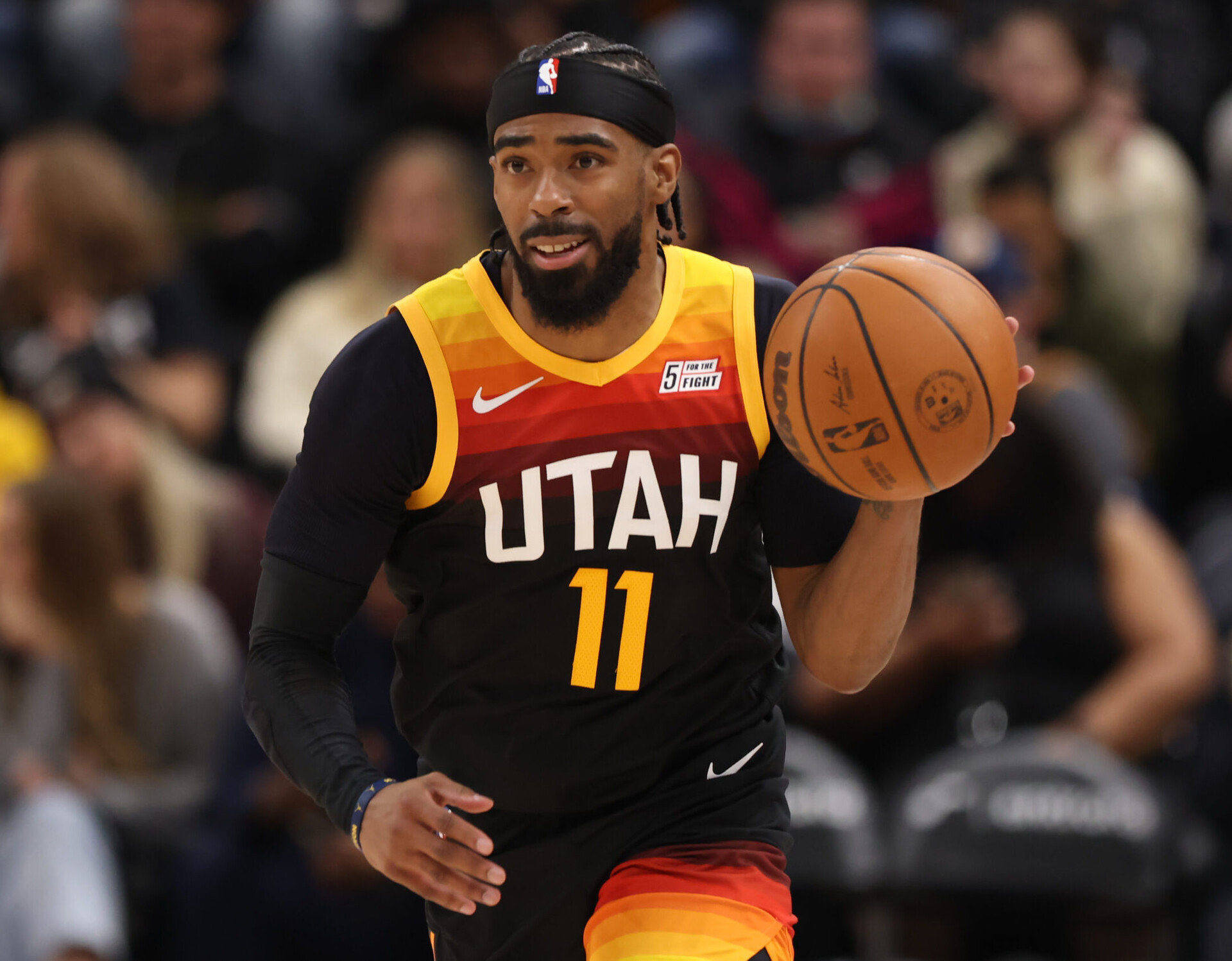 Utah Jazz guard Mike Conley brings the ball up the court in the third quarter against the Houston Rockets
