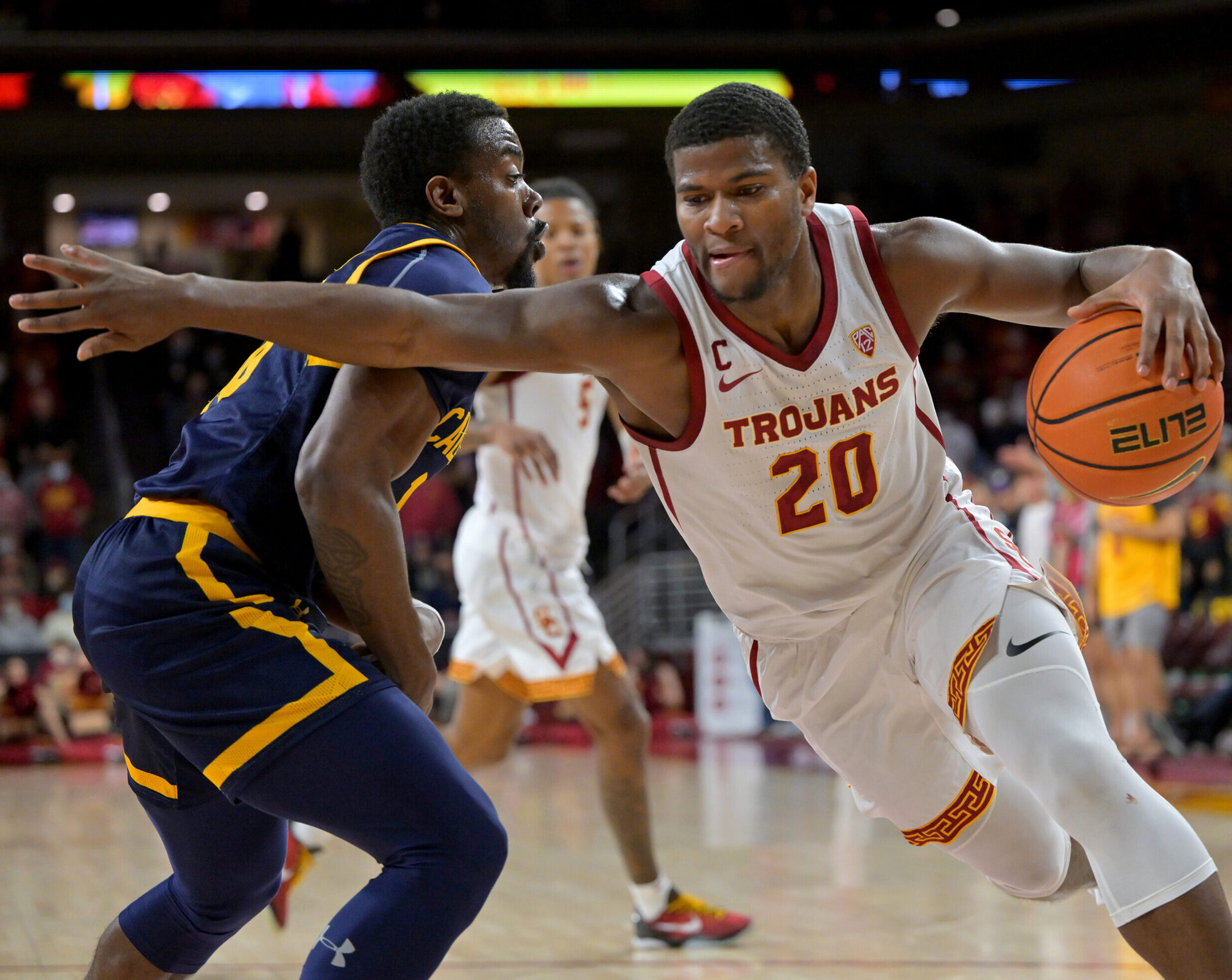 USC Trojans guard Ethan Anderson (right) is defended by California Golden Bears guard Makale Foreman (10) during a Pac-12 basketball game