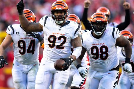 Bengals defensive end B.J. Hill (92) celebrates after intercepting a pass from Chiefs quarterback Patrick Mahomes during the AFC Championship Game