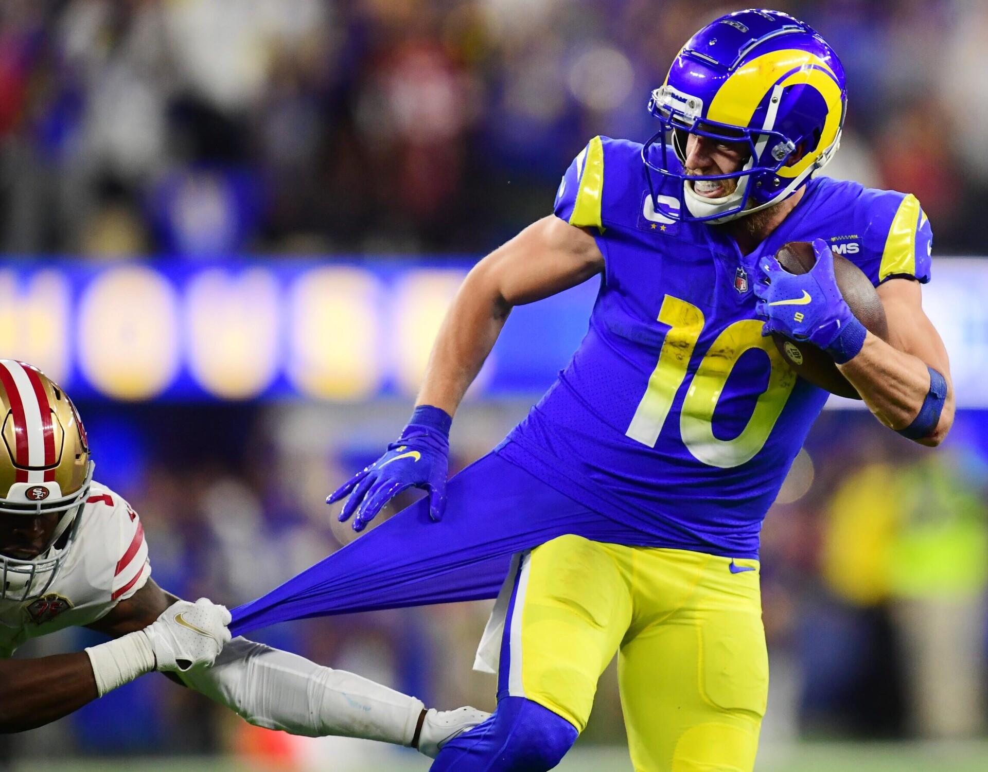 San Francisco 49ers free safety Jimmie Ward (left) pulls on the jersey of Los Angeles Rams wide receiver Cooper Kupp (right) in the fourth quarter during the NFC Championship Game