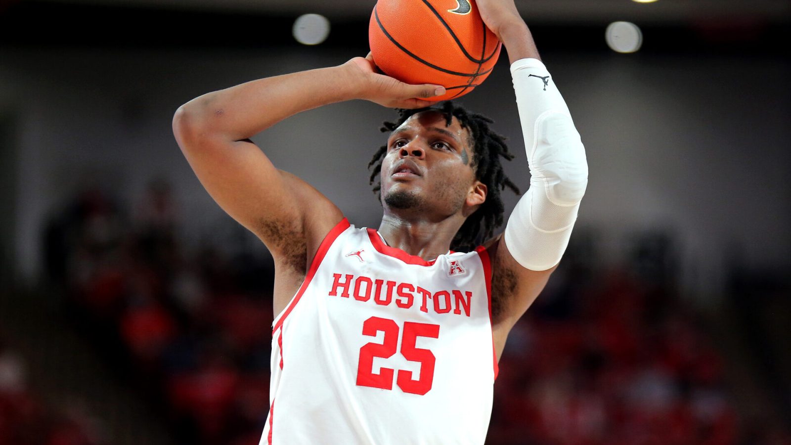 Wednesday College Basketball Betting - Houston Cougars center Josh Carlton shoots a free-throw against the Tulane Green Wave