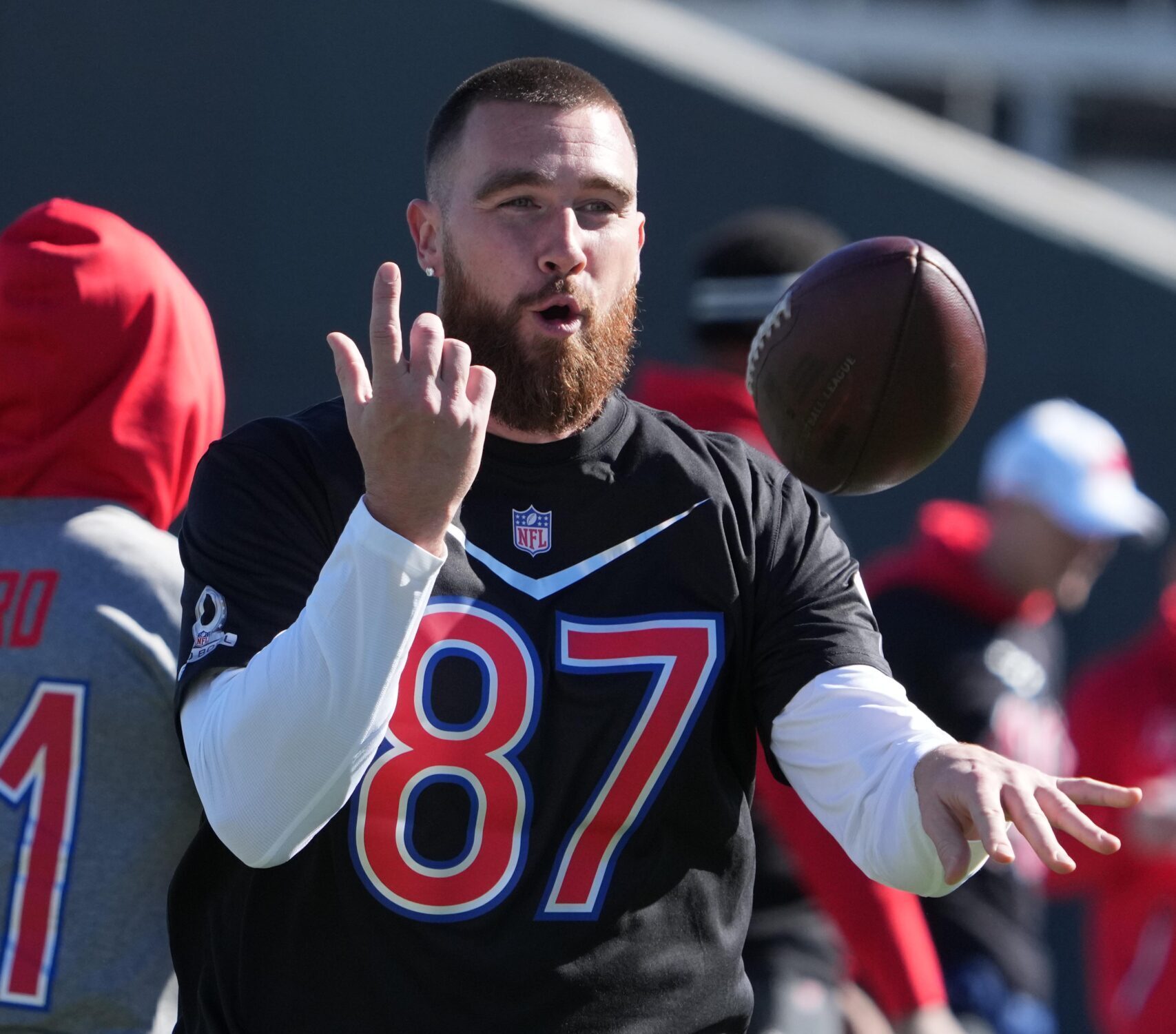 Feb 4, 2022; Las Vegas, NV, USA; Kansas City Chiefs tight end Travis Kelce (87) catches the ball during an interview at AFC practice at the Las Vegas Ballpark.