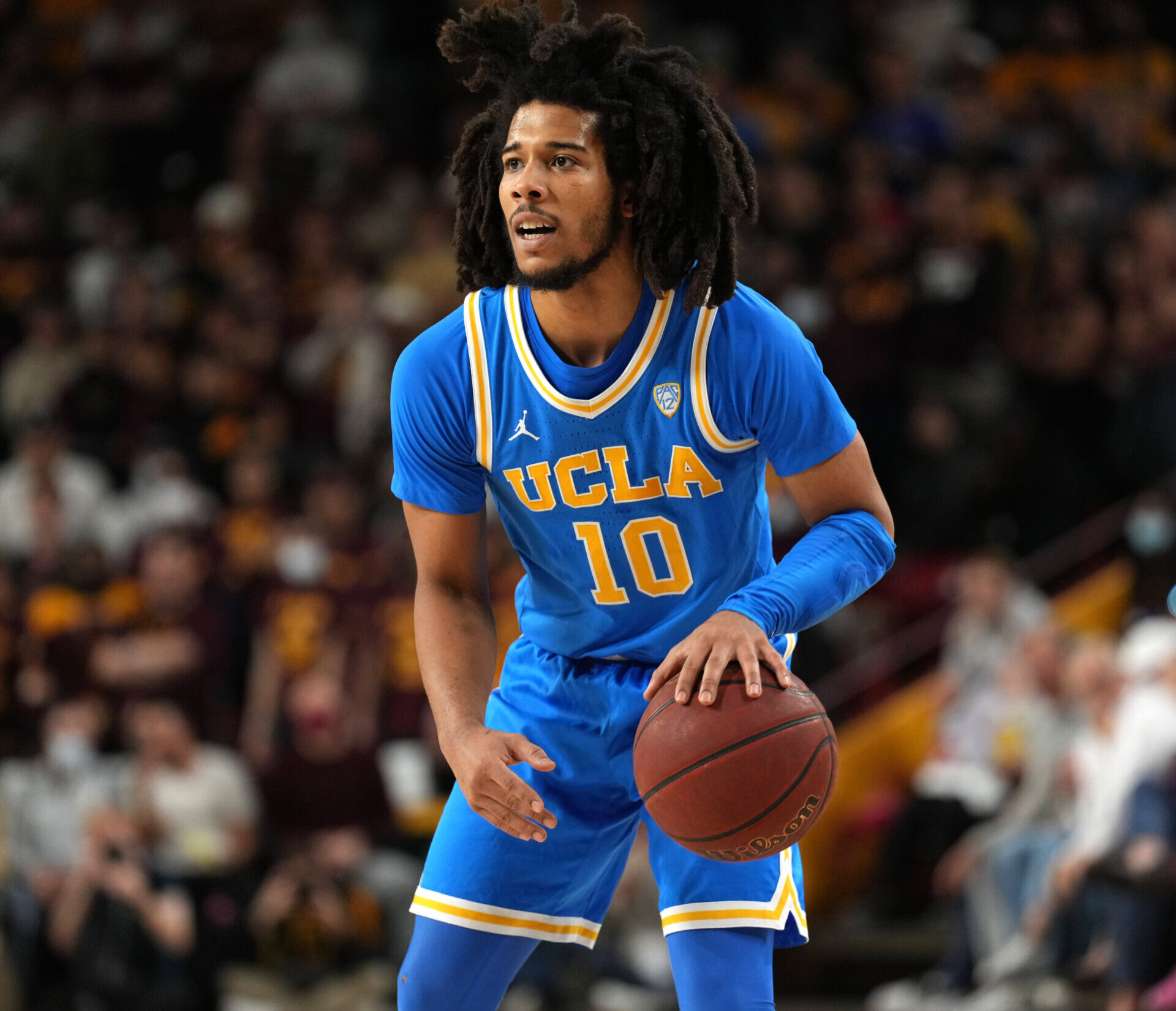 UCLA Bruins guard Tyger Campbell dribbles during a Pac-12 basketball game against the Arizona State Sun Devils